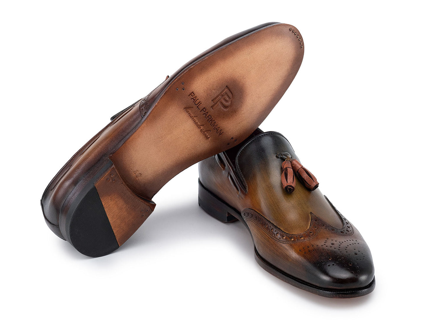 Paul Parkman Wingtip Tassel Loafers Green - WL34-GRN by Paul Parkman are made-to-order men's loafers featuring classic wingtip brogue detailing and tassels, offering timeless elegance and style. Displayed on a white background.