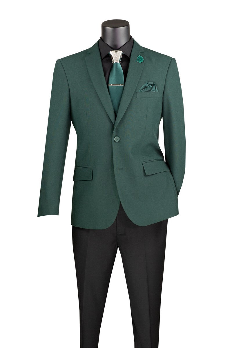 A mannequin is styled in a Vinci Suits Slim Fit Single Breasted 2 Buttons Solid Color Blazer in Hunter Green Z-S2PP, layered over a black shirt with a teal tie and matching pocket square, completed with solid black pants.