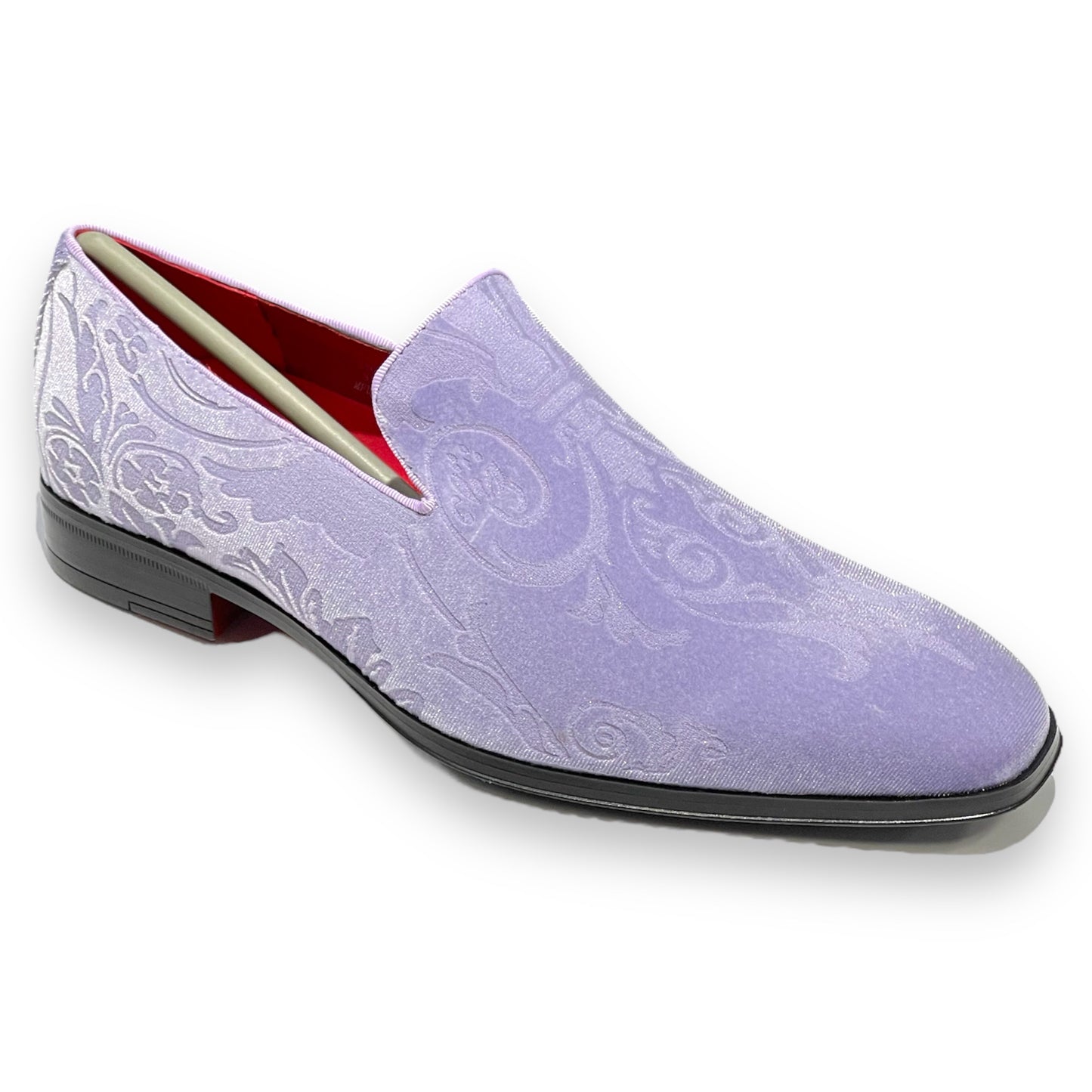 The After Midnight 7017 LAVANDER PAISLEY loafer by AFTER MIDNIGHT showcases ornate swirling patterns in light purple satin with a sleek buckle, a black sole, and vibrant red interior lining for elegance.