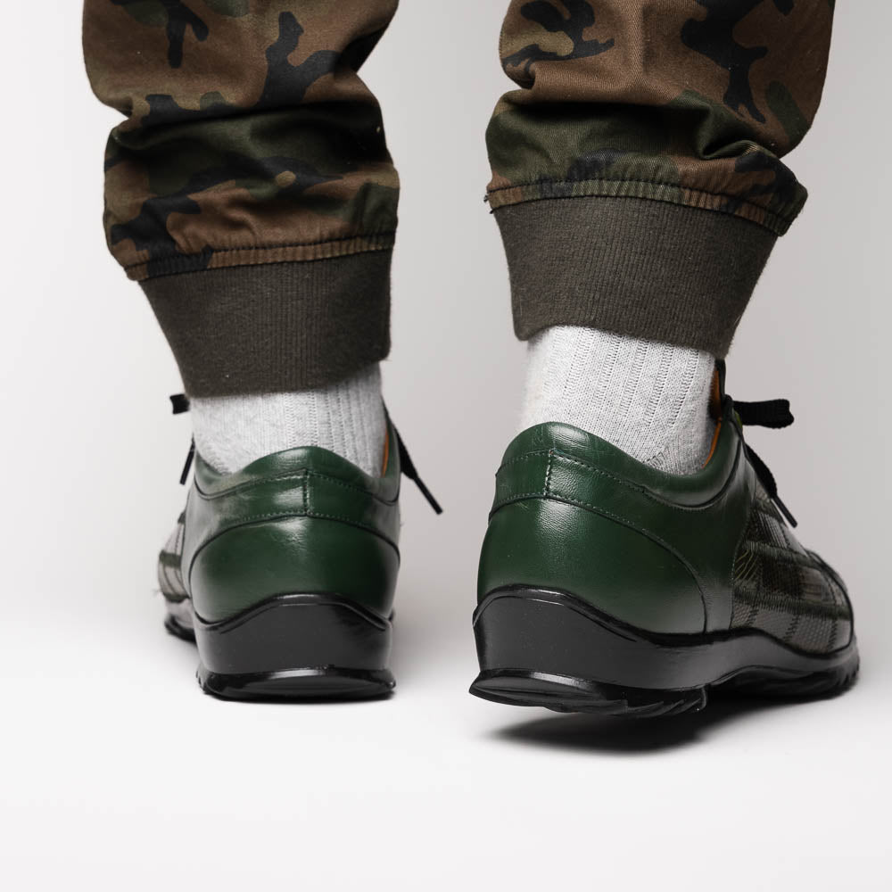 The Bari Green by Marco Di Milano are men’s lace-up dress shoes in dark green and black with a plaid pattern, leather accents, textured rubber soles, and a hand-painted finish for luxurious style.