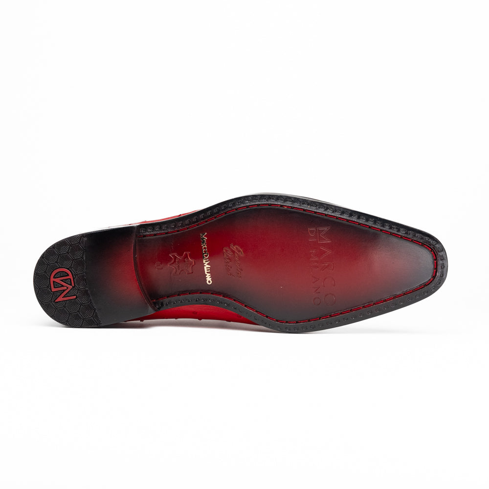 Introducing the Criss Red by Marco Di Milano: a pair of striking red genuine ostrich quill leather dress oxford shoes with black laces—one elegantly upright and the other displayed on its side to showcase the luxurious sole. This luxury footwear commands attention at every step.