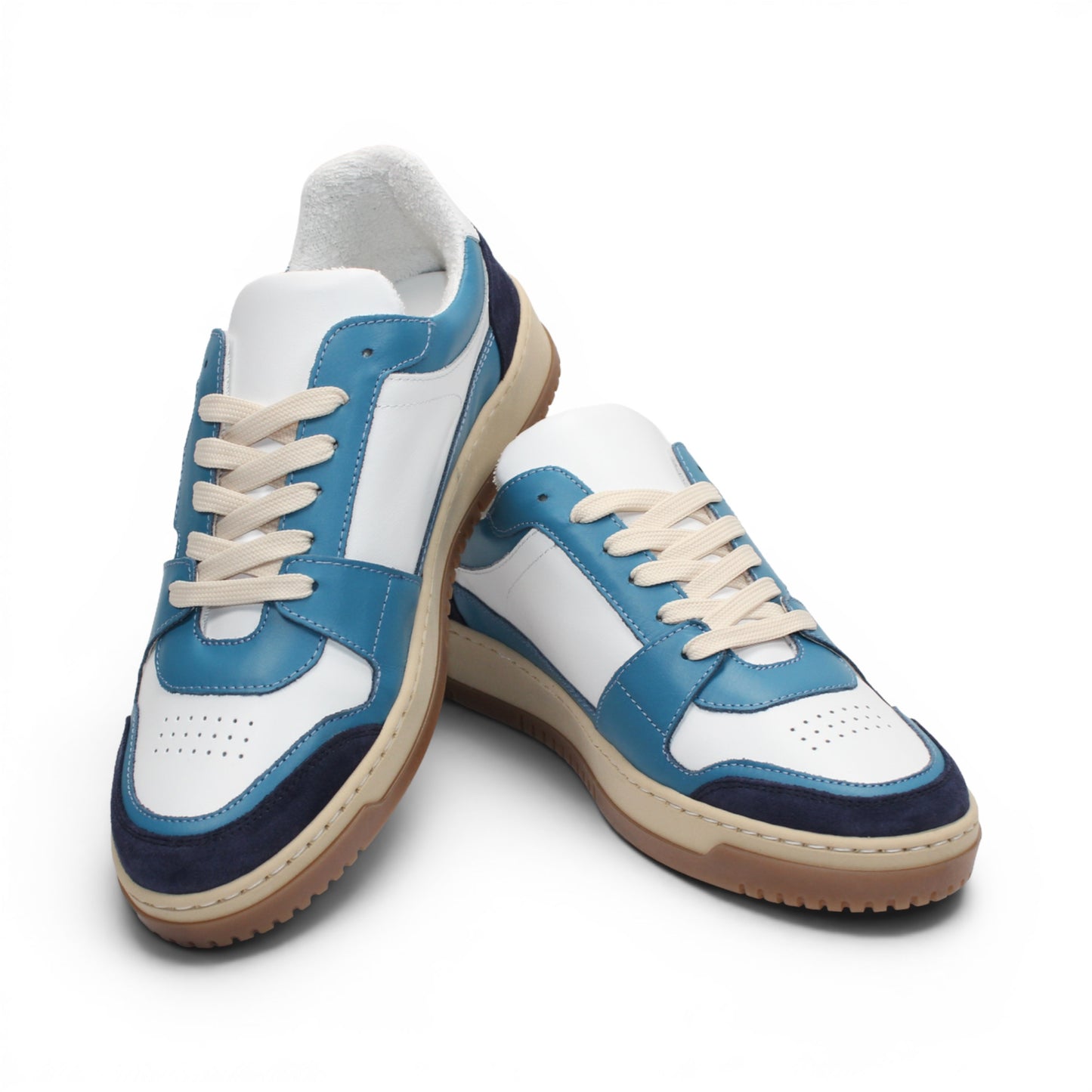 The Duca Di Matiste Duca DC80 Blue Combo is a luxury low-top casual shoe in blue, white, and beige with a gum sole, white laces, and a mix of calf leather and suede materials.
