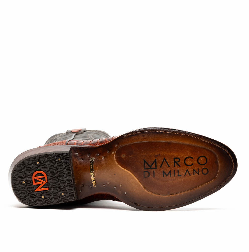 The Denver Rustic Cognac by Marco Di Milano is a pair of Western cowboy boots with brown leather vamps, dark shafts, decorative stitching, and the brand name on the sole.