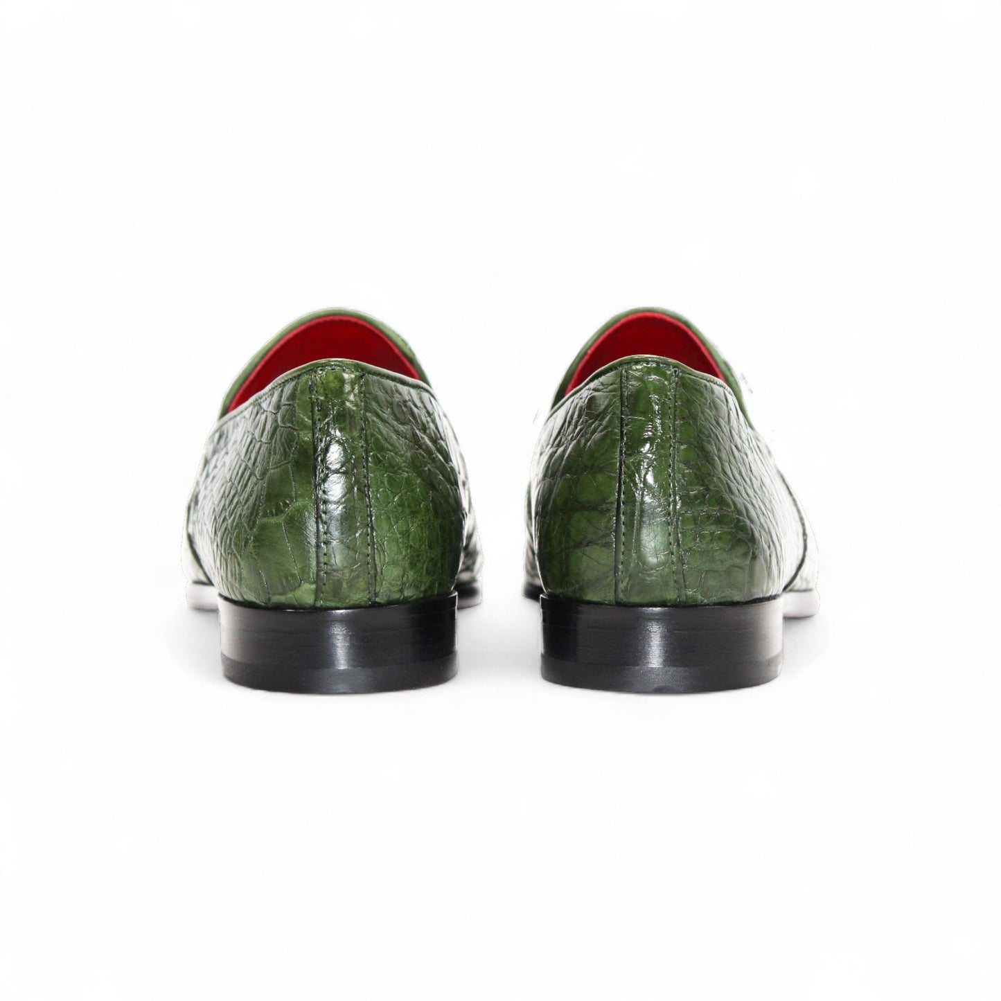 The Fennix of Italy Fennix Easton Green is a green crocodile-patterned leather loafer with Italian craftsmanship, a black sole, and red interior, displayed in side profile on a white background.