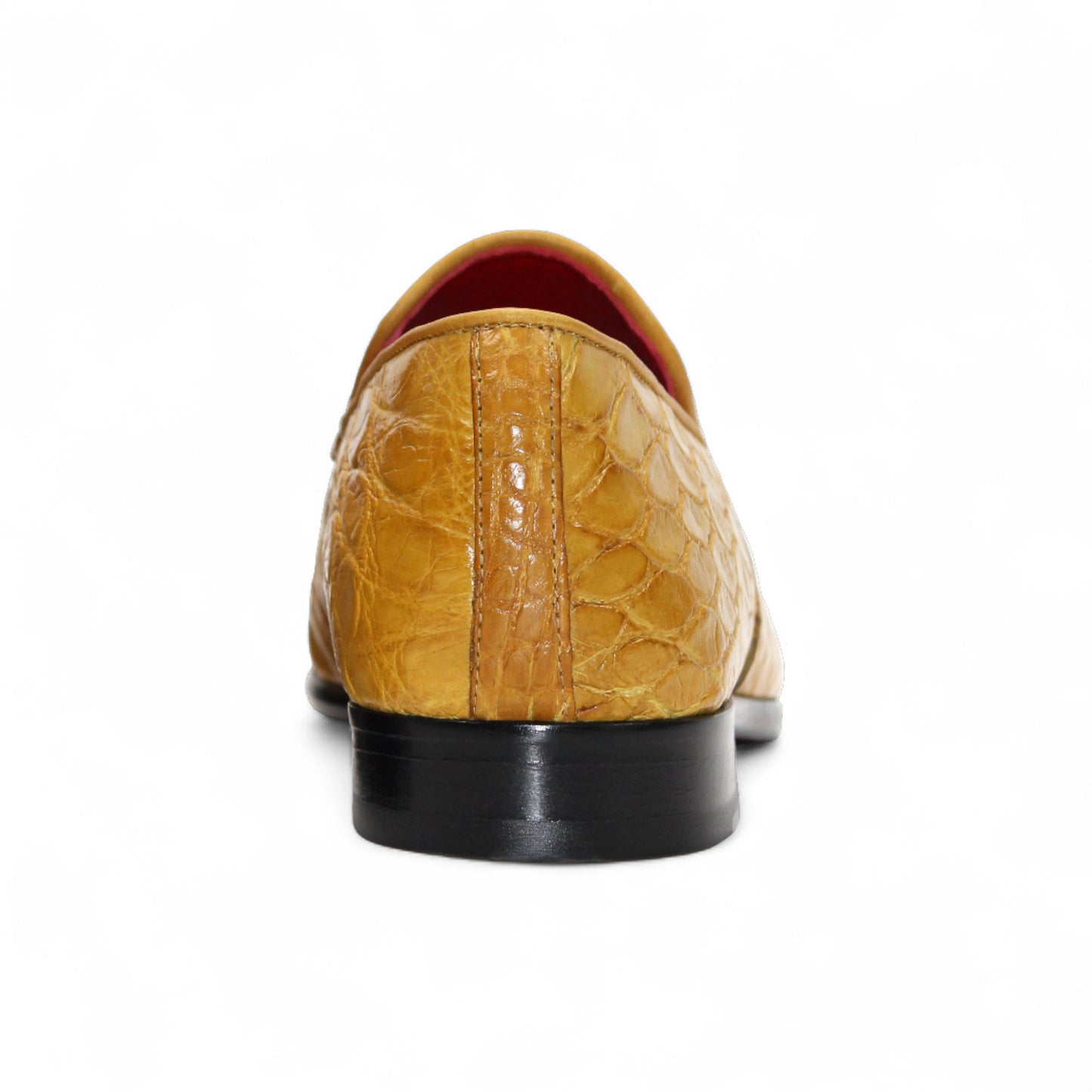 The Fennix of Italy Easton Mustard loafer is a yellow premium crocodile leather shoe with Italian craftsmanship, a black sole, and is shown in profile against a plain white background.