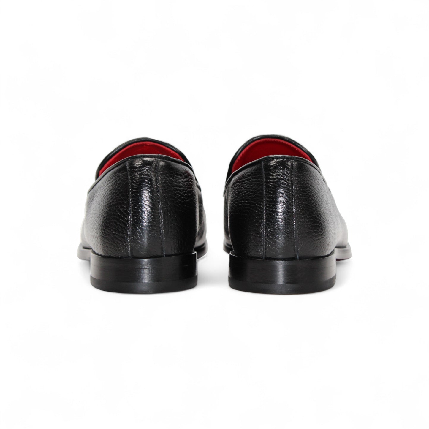 The Emilio Franco Edgardo Black is a men’s loafer crafted from black deerskin leather with a metal horsebit detail and red interior, showcased on a white background—luxury footwear by Emilio Franco.