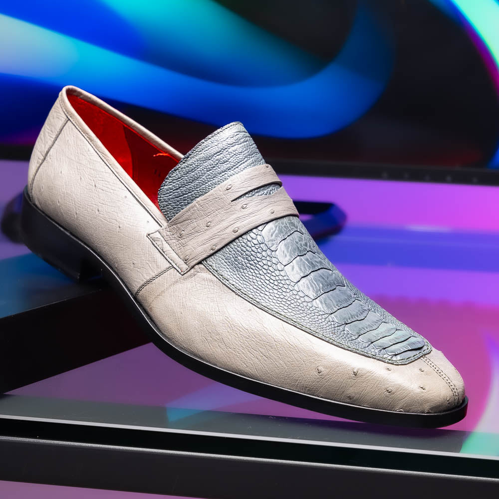 A pair of Marco Di Milano Fangio Gray formal slip-on dress shoes with textured leather and a hand-painted finish, one upright and the other on its side displaying the sole.