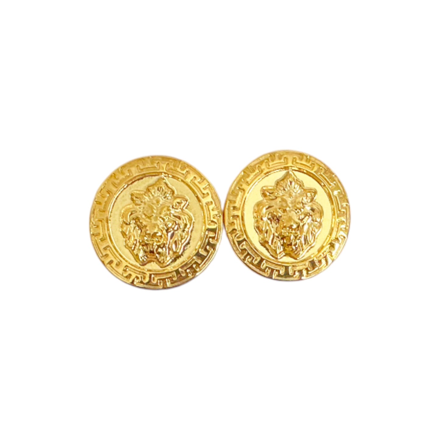 Matiste Gold Cufflinks by Matiste feature two round gold pieces with raised lion head designs and decorative borders, displayed against a white background.