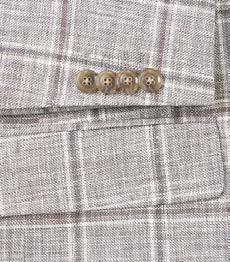 The Renoir Alessandro Vitello by Renoir New Slim Fit Sport Coat 610-9 features a gray plaid design with a single button and notch lapel. It is styled with a white shirt and striped tie, while a pocket square adds flair to the side-vented design by peeking from the chest pocket.