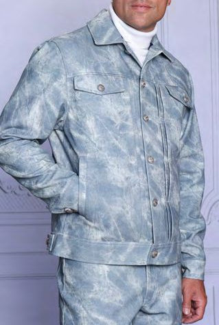 Someone wearing the Insomnia INSOMNIA CHIVAS 2PC Stamped Concrete PU Casual Jacket & Pants Ice Set, featuring a light blue look over a white turtleneck, stands with one hand in their pocket.