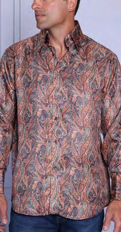 Man wearing the Insomnia INSOMNIA MZT-202 Poly/Rayon Satin Bronze Shirt, a long-sleeved, button-up shirt with a multicolored paisley pattern, standing against a light background.