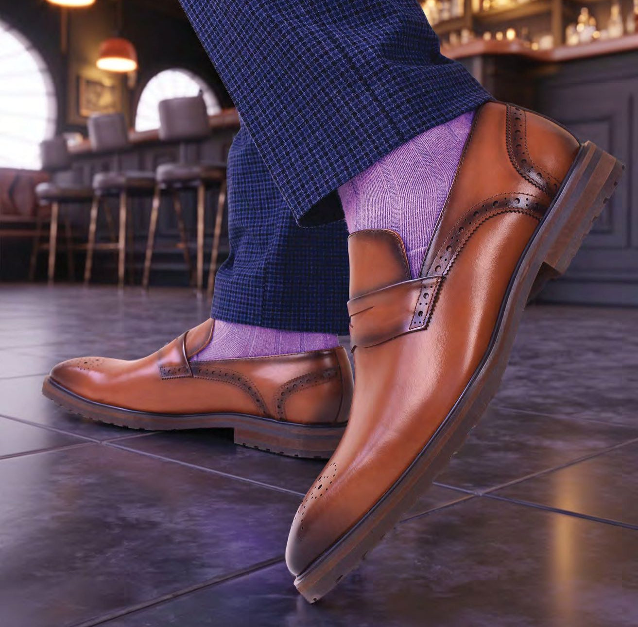 The Giovanni Silvio Tan Leather Shoes by GIOVANNI feature smooth tan leather, a plain toe, low heel, decorative perforations, and a penny loafer strap. Photographed on a white background.