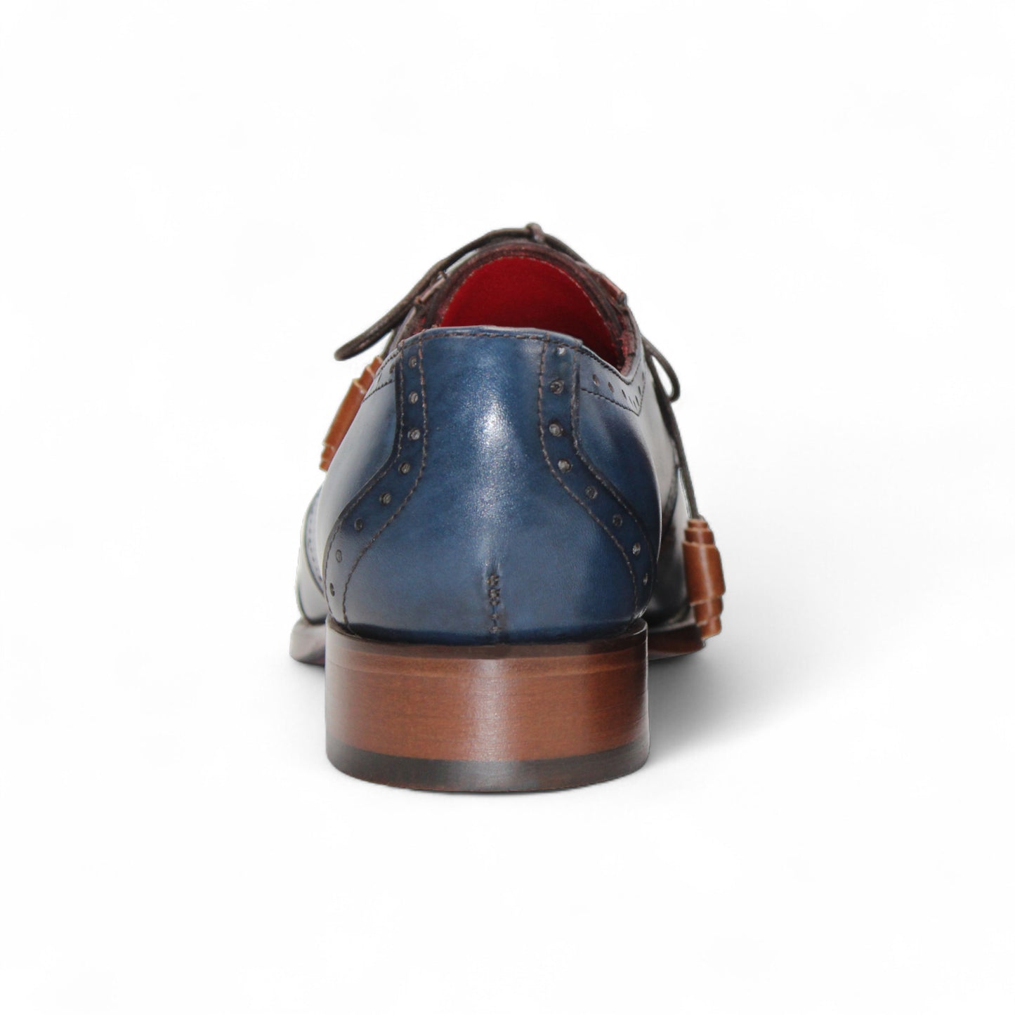 The Fennix Jax Cognac/Navy by Fennix of Italy is a luxury men's dress shoe with a blue leather upper, brown leather toe and heel accents, brogue details, brown laces, and Italian craftsmanship, shown in profile on a plain white background.