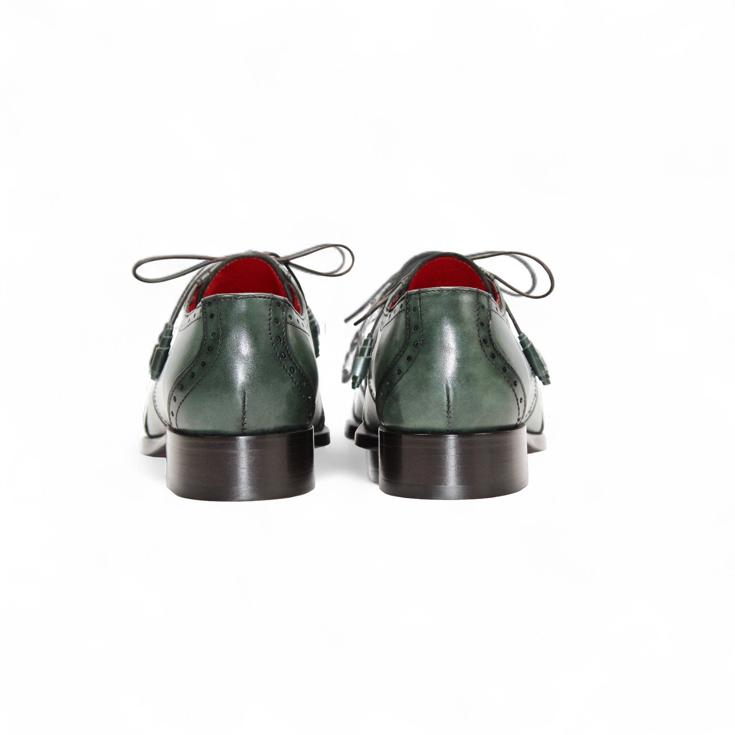 The Fennix Jax Green by Fennix of Italy is a green luxury leather dress shoe with brogued detailing, laces, and a low wooden heel, reflecting Italian craftsmanship and shown in profile against a white background.