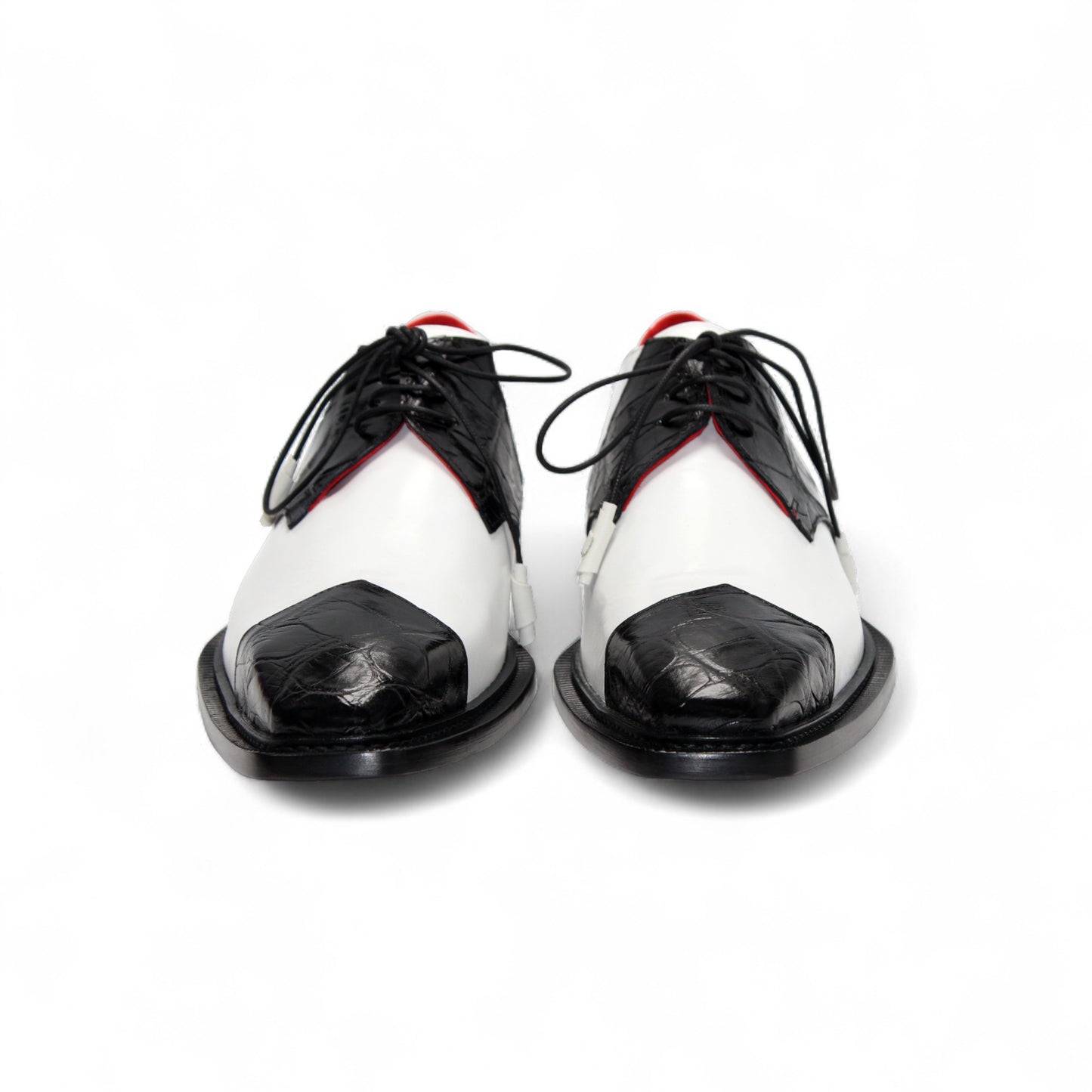 The Fennix of Italy Landon 2 Black/White is a luxury leather oxford with laces, a pointed toe, and low heel—an elegant display of Italian craftsmanship set against a white background.