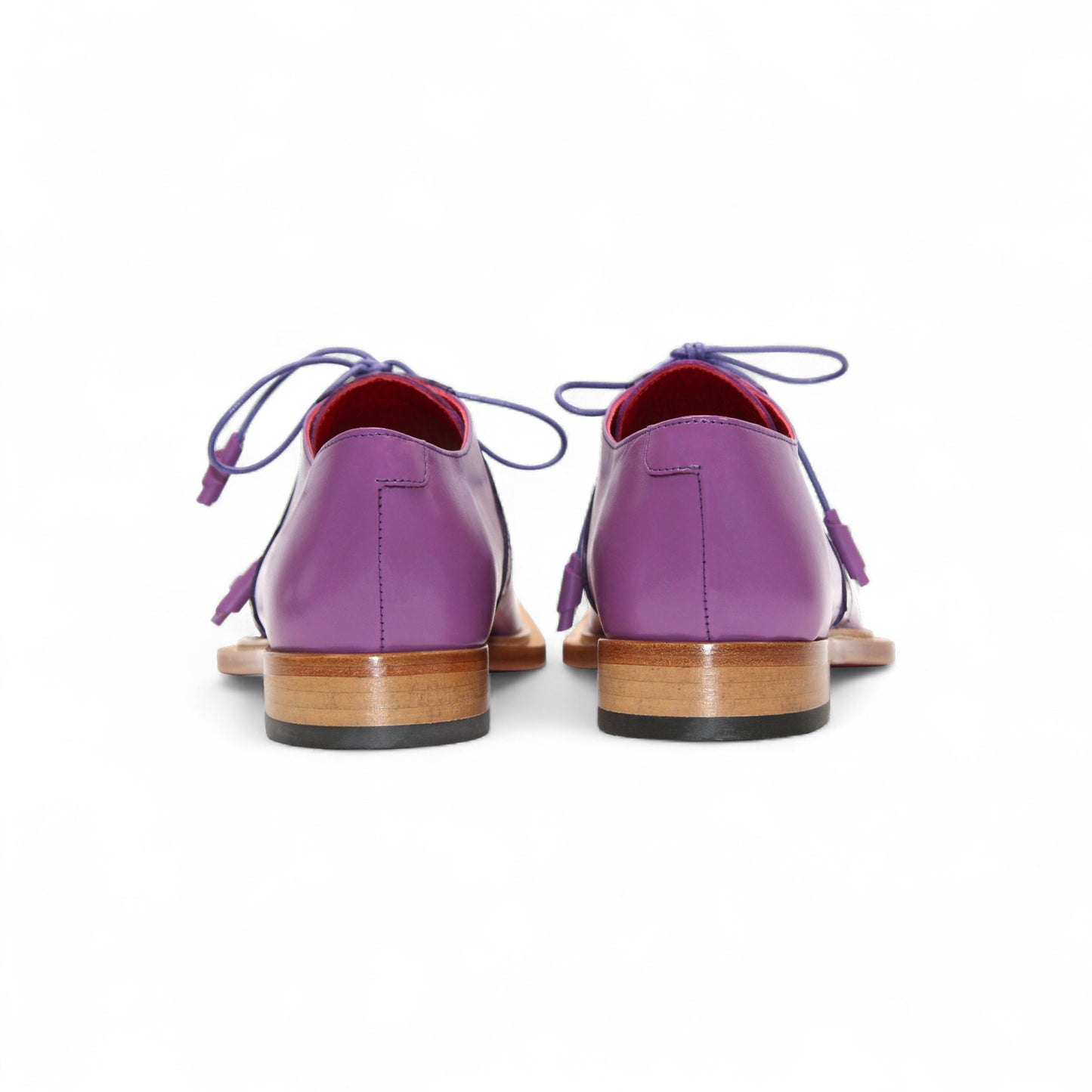 The Fennix Landon 2 Purple/Lavender by Fennix of Italy is a luxury leather shoe with a wooden sole, smooth and textured panels in purple and lavender, purple laces, and crafted with exquisite Italian artistry.