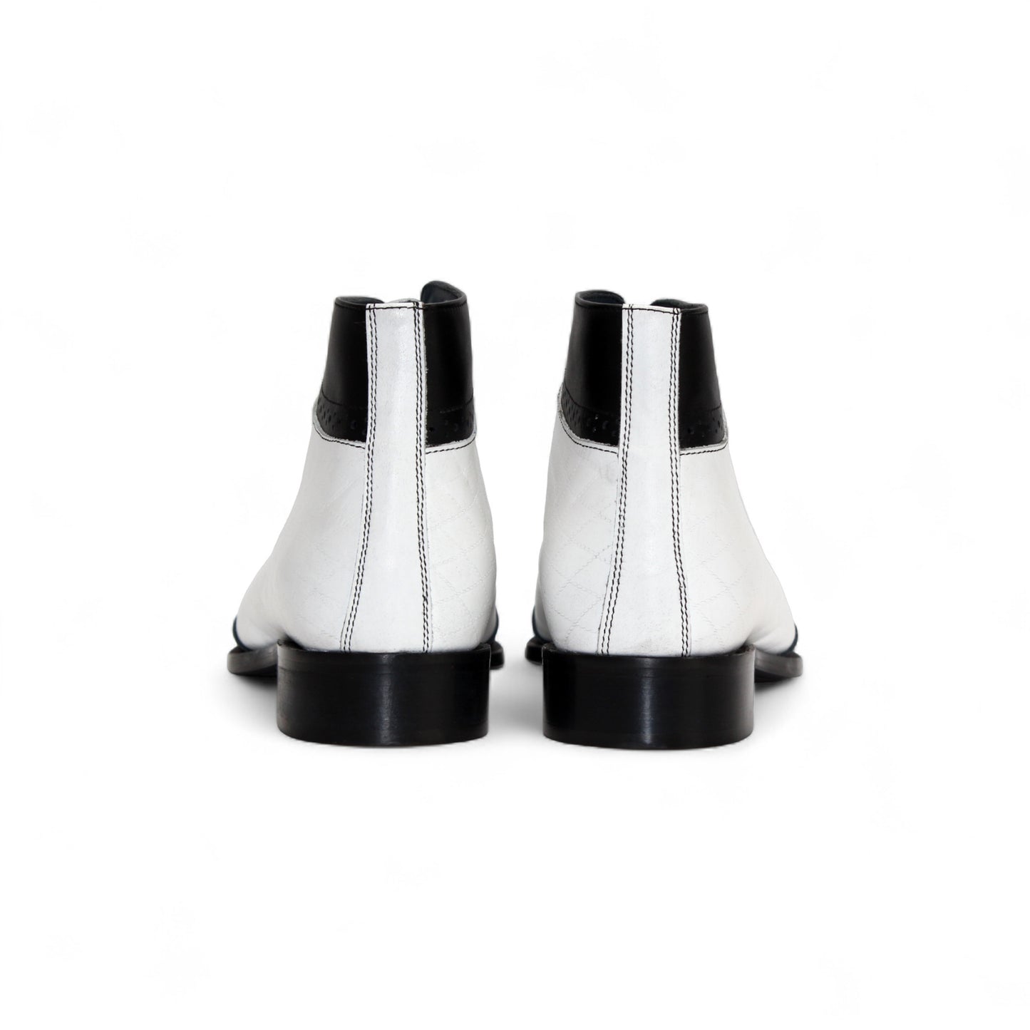 The Duca Di Matiste Duca Lauro Black/White is an Italian leather lace-up dress shoe in black and white, featuring a low heel and decorative perforations on the toe and seams, shown against a white background.