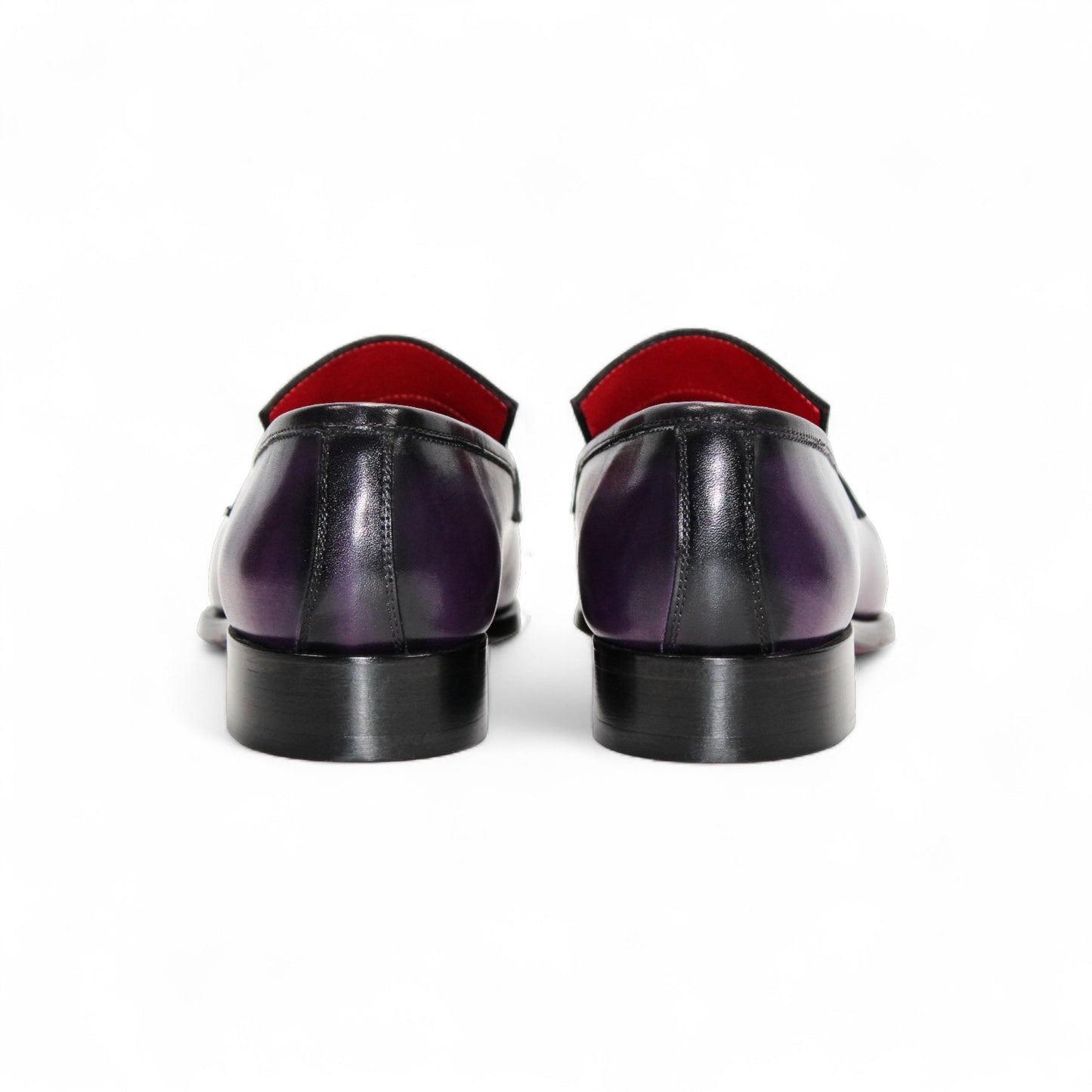 The Fennix of Italy Fennix Liam Purple is a purple leather loafer with a low heel, penny strap, and leather sole crafted in Italy, displayed in profile on a white background.