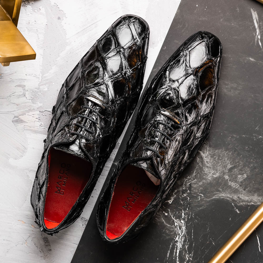 The Olivieri Black by Marco Di Milano: luxurious black crocodile-patterned leather oxfords with red interior lining, displayed to show off the striking brown sole—a true statement in designer footwear.