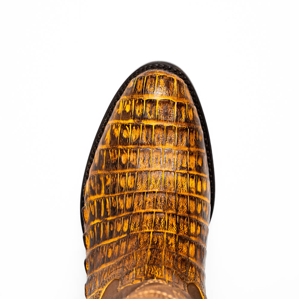 The Phoenix Mustard Brown by Marco Di Milano is a pair of Western boots in genuine caiman belly leather with a textured exotic finish and branded sole, shown against a white background.
