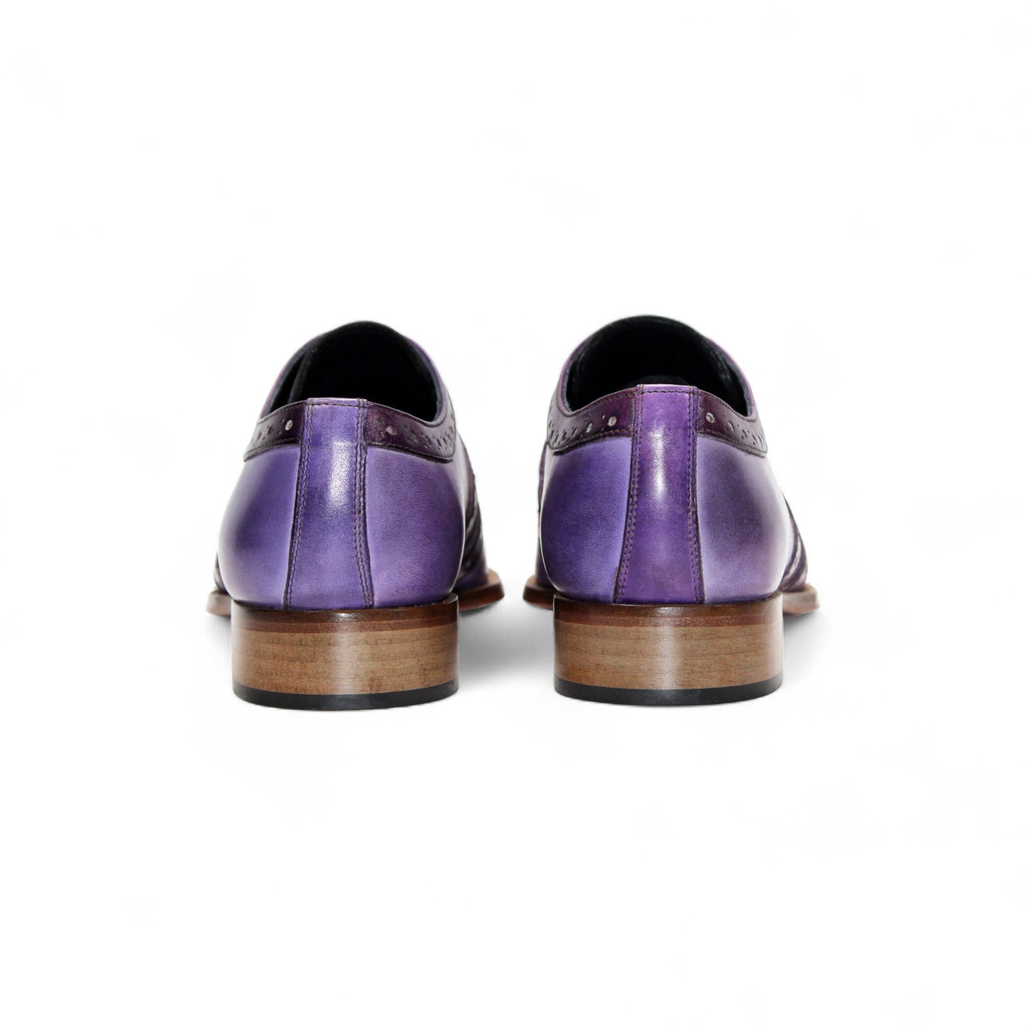 The Duca Di Matiste Duca Savona Lavender/Purple is a genuine leather dress shoe with dark purple detailing, brown sole, and laces—ideal for those seeking minimalist style with a distinctive touch. Shown in profile on a white background.