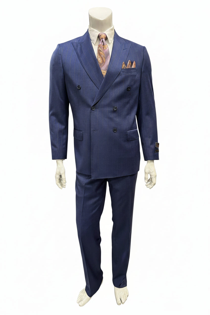 A mannequin is dressed in a Tiglio Luxe Dolcetto Modern Fit Blue with Mocha Stripe Wool Suit (TL7020), paired with a patterned tie and pocket square. The display is set in a men's clothing store offering luxury menswear, with various Tiglio Luxe suits showcased on racks in the background.