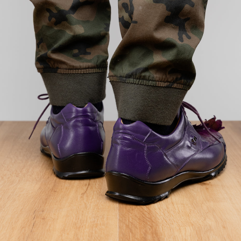 Introducing Udine Purple by Marco Di Milano, these luxury men’s leather dress shoes feature a striking purple hue with a distinctive textured ribbed front design and sturdy black rubber soles, seamlessly blending classic elegance with modern style.
