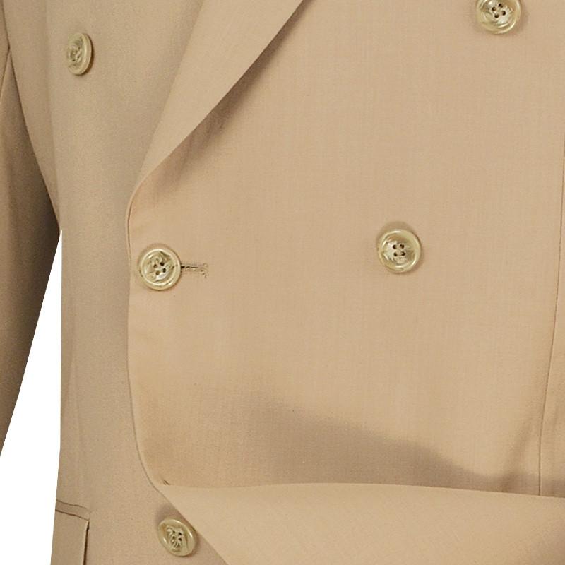 The Vinci Suits Regular Fit Double Breasted 2 Piece Suit (Beige) DC900-1, paired with a blue shirt, patterned tie, and pocket square, is elegantly displayed on a wooden mannequin.