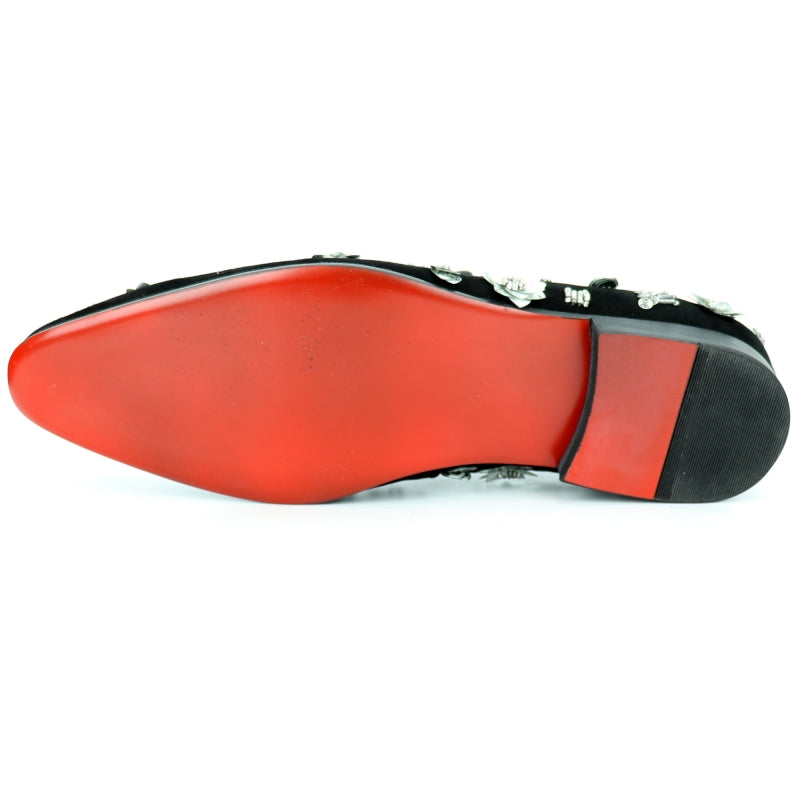 The FI-7272 Black Silver Fiesso by Aurelio Garcia, a stylish creation from Fiesso, is a black velvet loafer adorned with silver floral and gemstone embellishments and enhanced with a leather lining for added comfort.