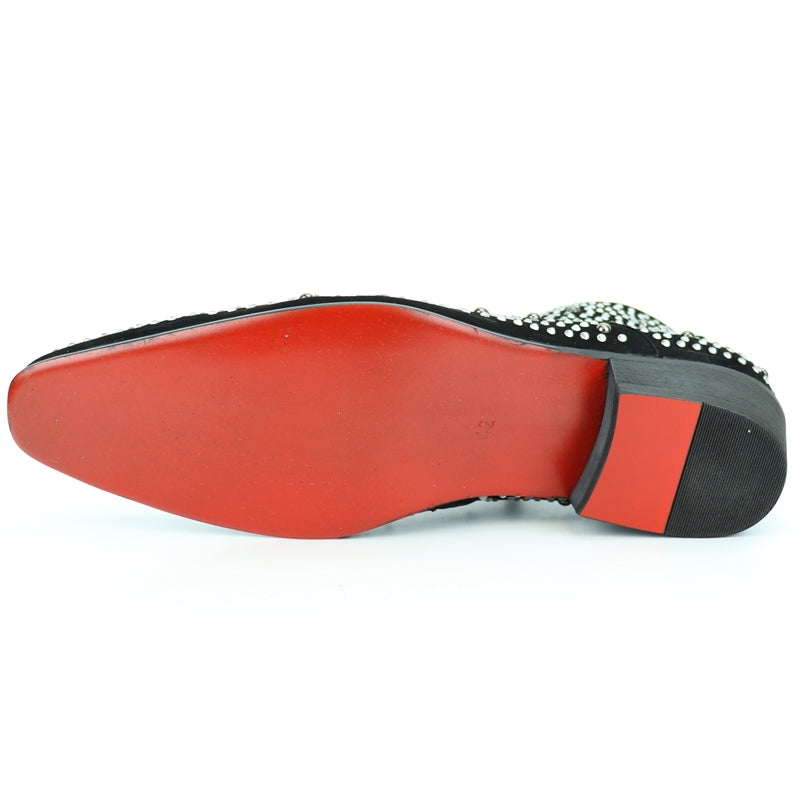 The FI-7284 Black Suede Silver Stones Fiesso by Aurelio Garcia, from the brand Fiesso, combines chic style with a black suede upper embellished with gleaming silver studs and a low heel. Experience comfort with its cushioned insole.