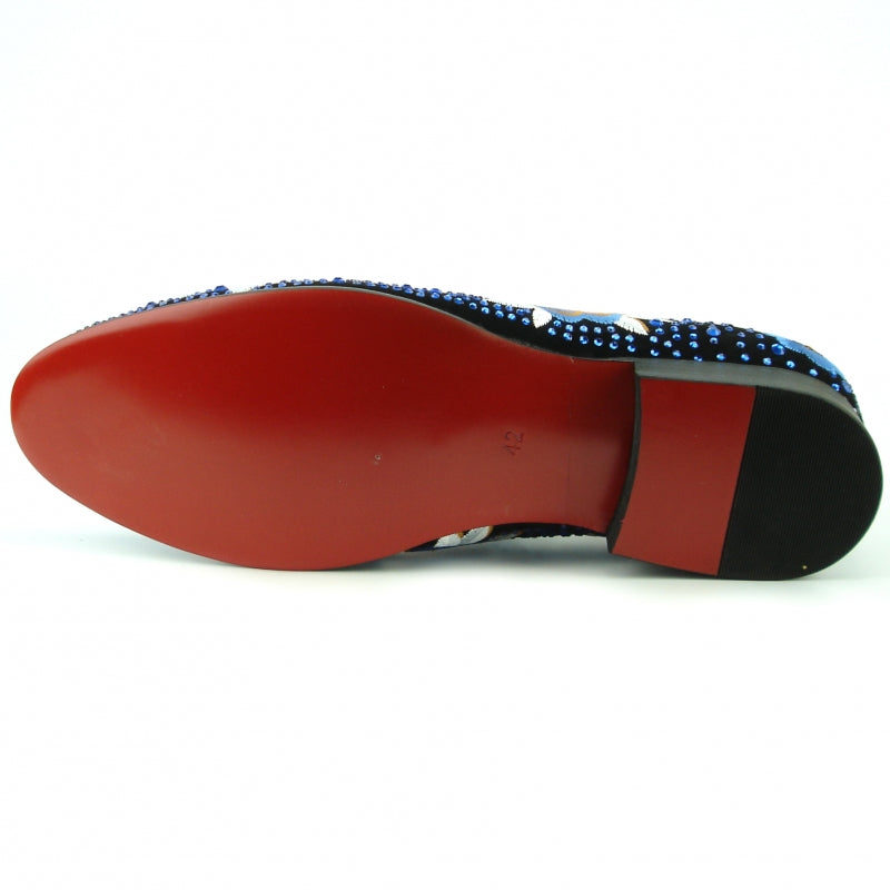 The FI-7360 Blue Stones slip-on shoe by Fiesso features blue suede with colorful sequins, rhinestones, and floral embroidery.