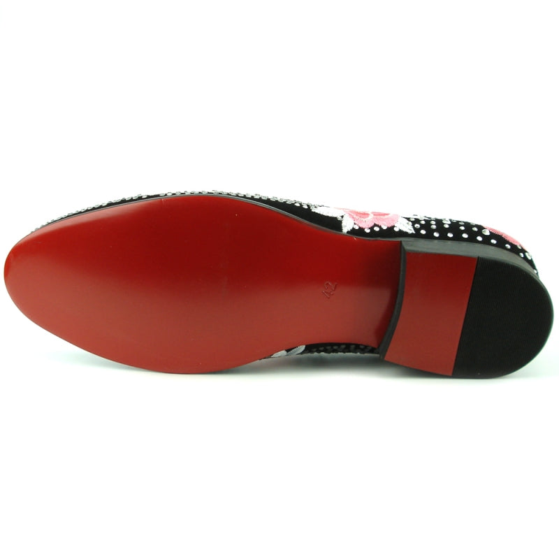 The FI-7360 Silver Stones slip-on fashion shoe by Fiesso features pink floral embroidery and white beaded embellishments on luxurious suede for a sophisticated touch.