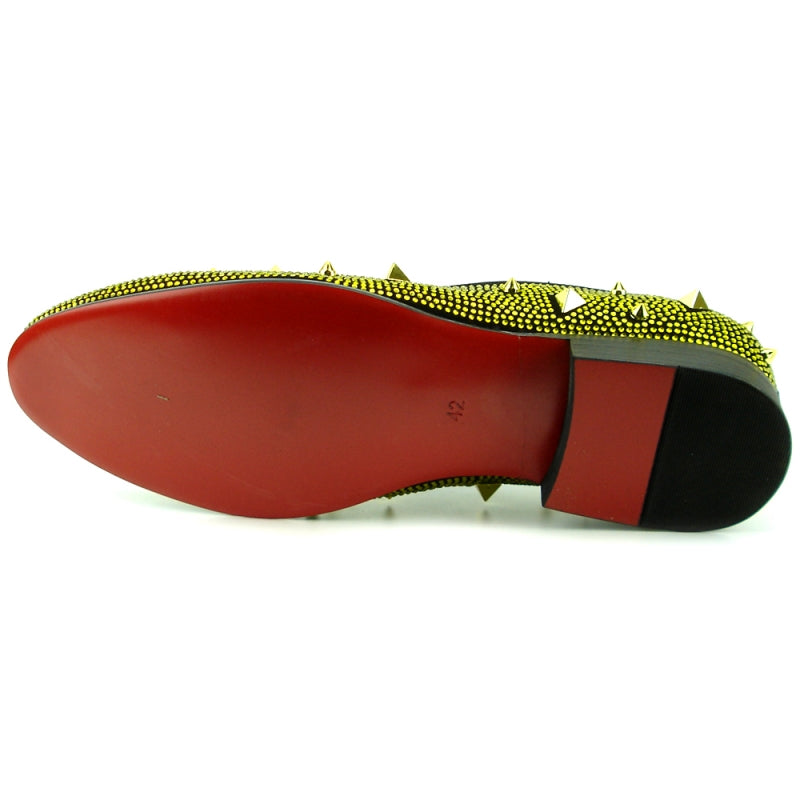 A Fiesso FI-7364 Black/Gold shoe by Aurelio Garcia, crafted from yellow suede, features a slip-on design adorned with black trim and rhinestones, complete with uniquely shaped spikes on a low heel.