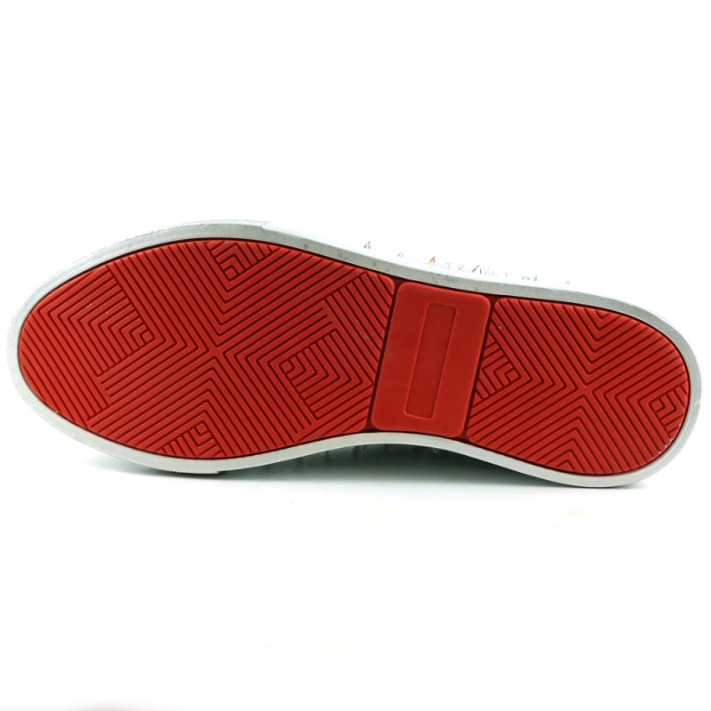 The FI-2413 Silver Glitter Spike Low Cut Sneaker Encore by Fiesso offers a stunning combination of sparkle and comfort, featuring a glitter upper embellished with large rhinestones, a reflective toe, cushioned insole, and white rubber sole.