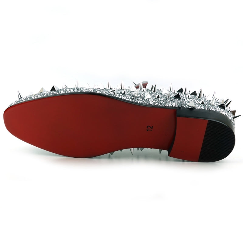 Introducing the FI-7517 by Fiesso, a stunning Silver Glitter shoe with an eye-catching loafers adorned with dazzling silver spikes and a vibrant red interior lining.