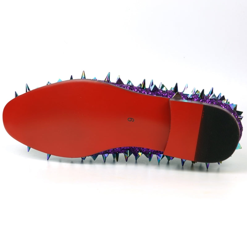 Introducing the FI-7517 Purple Glitter Loafer by Fiesso—a show-stopping piece highlighted with iridescent purple spikes and a radiant red interior lining. Slip into this Fiesso creation for an unforgettable burst of bold fashion.