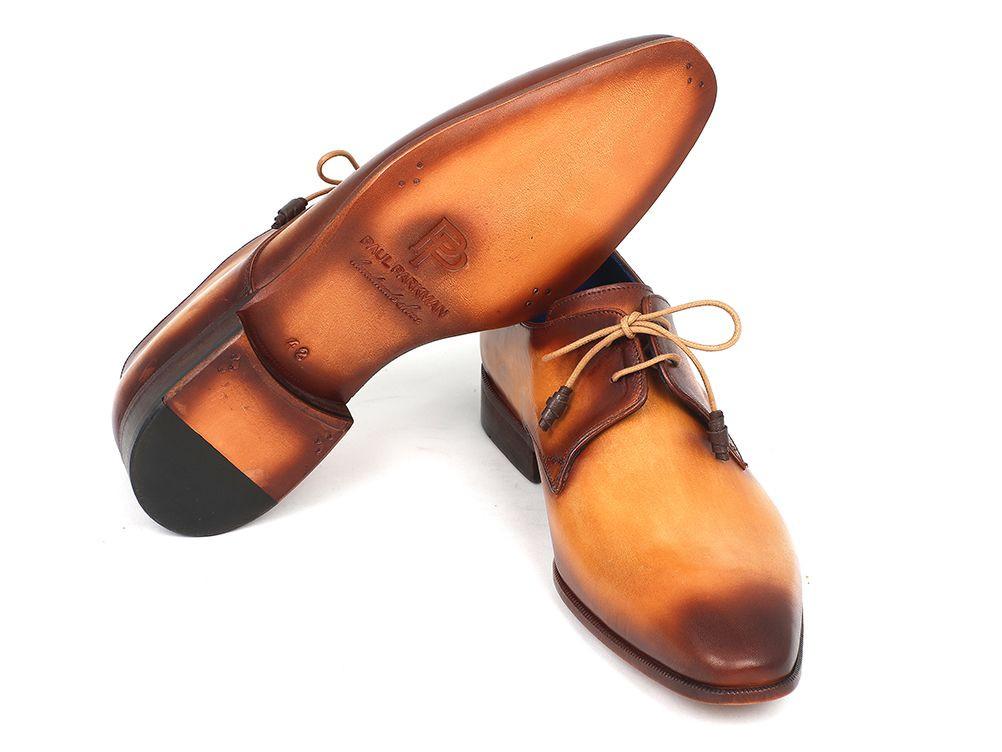 Introducing the Paul Parkman Brown & Camel Hand-Painted Derby Shoes - 326-CMLBRW, a testament to classic craftsmanship. These Derby-style dress shoes feature a combination of tan and brown hand-painted leather with beige laces, complemented by a polished finish and wooden sole.