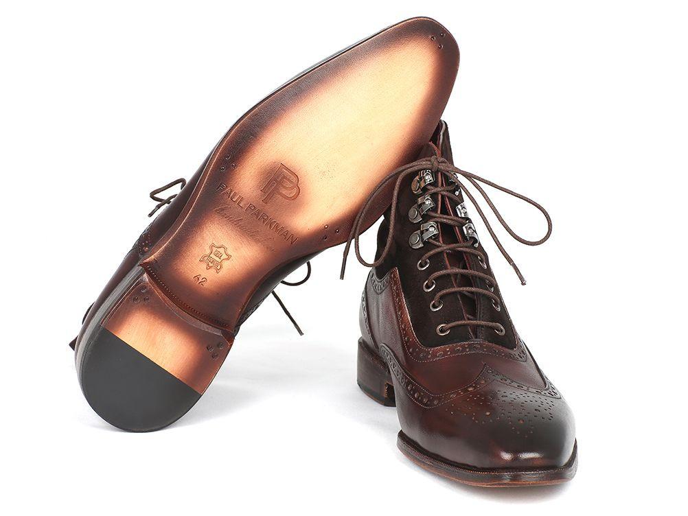 Introducing the Paul Parkman Wingtip Boots Brown Suede & Calfskin - 991-BRW. These men's made-to-order boots from Paul Parkman feature dark suede uppers with detailed perforations and lace-up fronts, seamlessly blending classic style with bespoke craftsmanship.