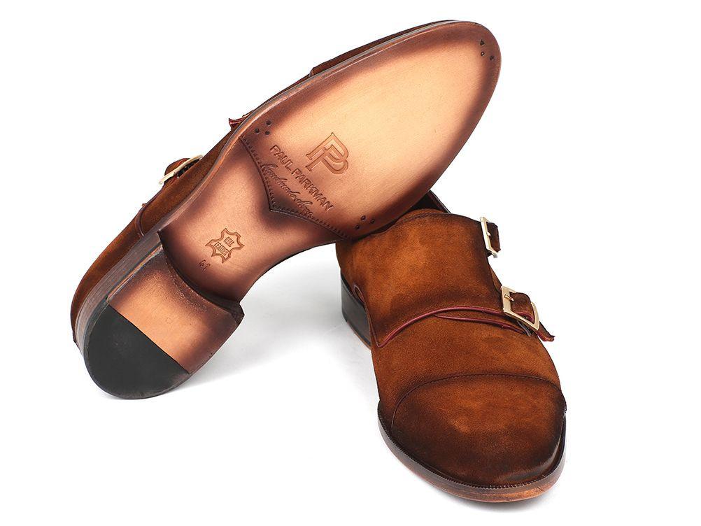The Paul Parkman Captoe Double Monkstrap Camel Suede - 045TAB12 shoes by Paul Parkman are a pair of handcrafted suede double monk strap shoes with silver buckles, featuring a cap toe design and red interior lining.