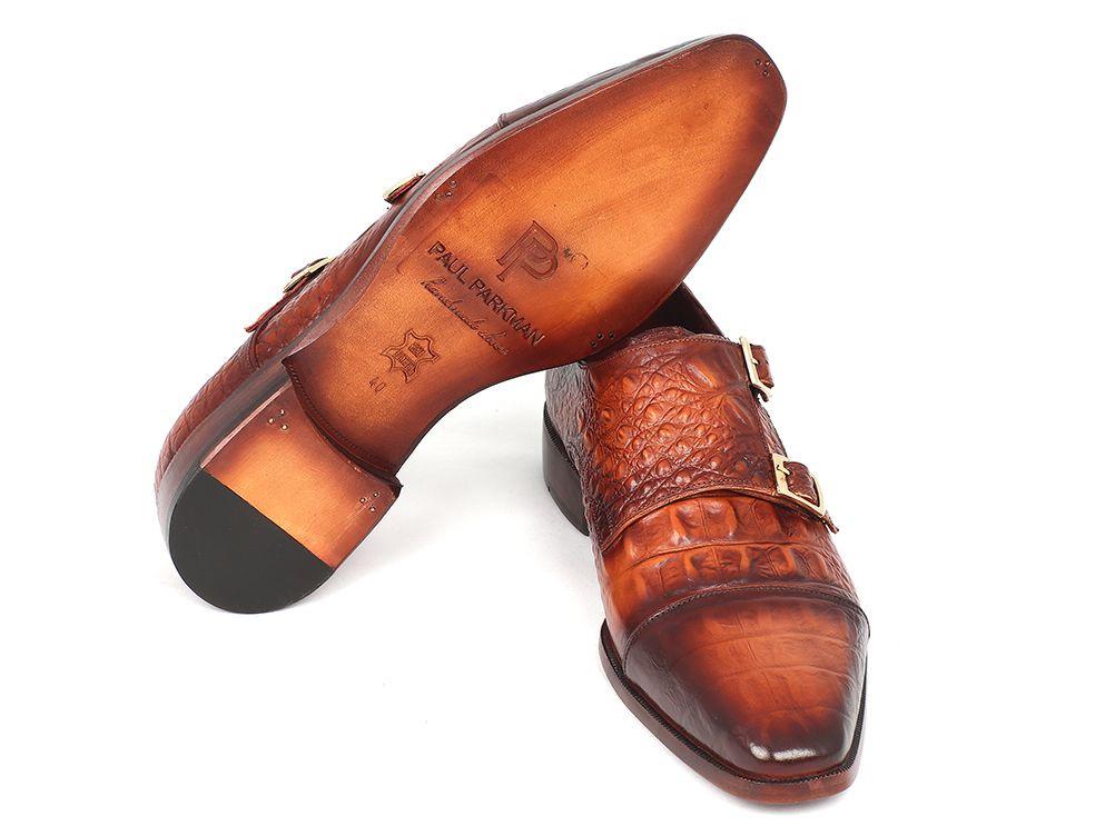 Paul Parkman Double Monkstrap Brown Crocodile Embossed Calfskin shoes (Model: PP2280) by Paul Parkman, featuring two buckles, positioned in a crossed layout on a white backdrop.