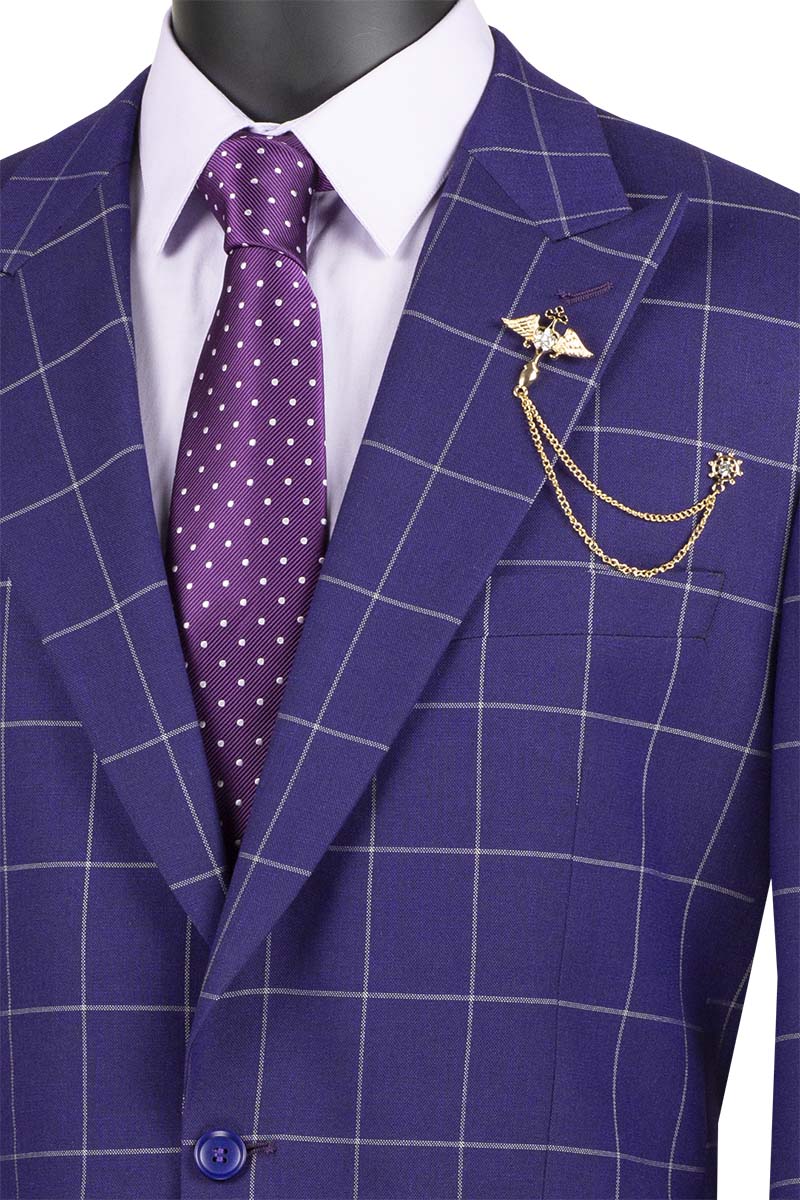 A mannequin showcases the Vinci Suits 2 Piece Windowpane Suit (Purple) 2RW-2, complete with a complementary polka dot tie and stylish lapel chain.