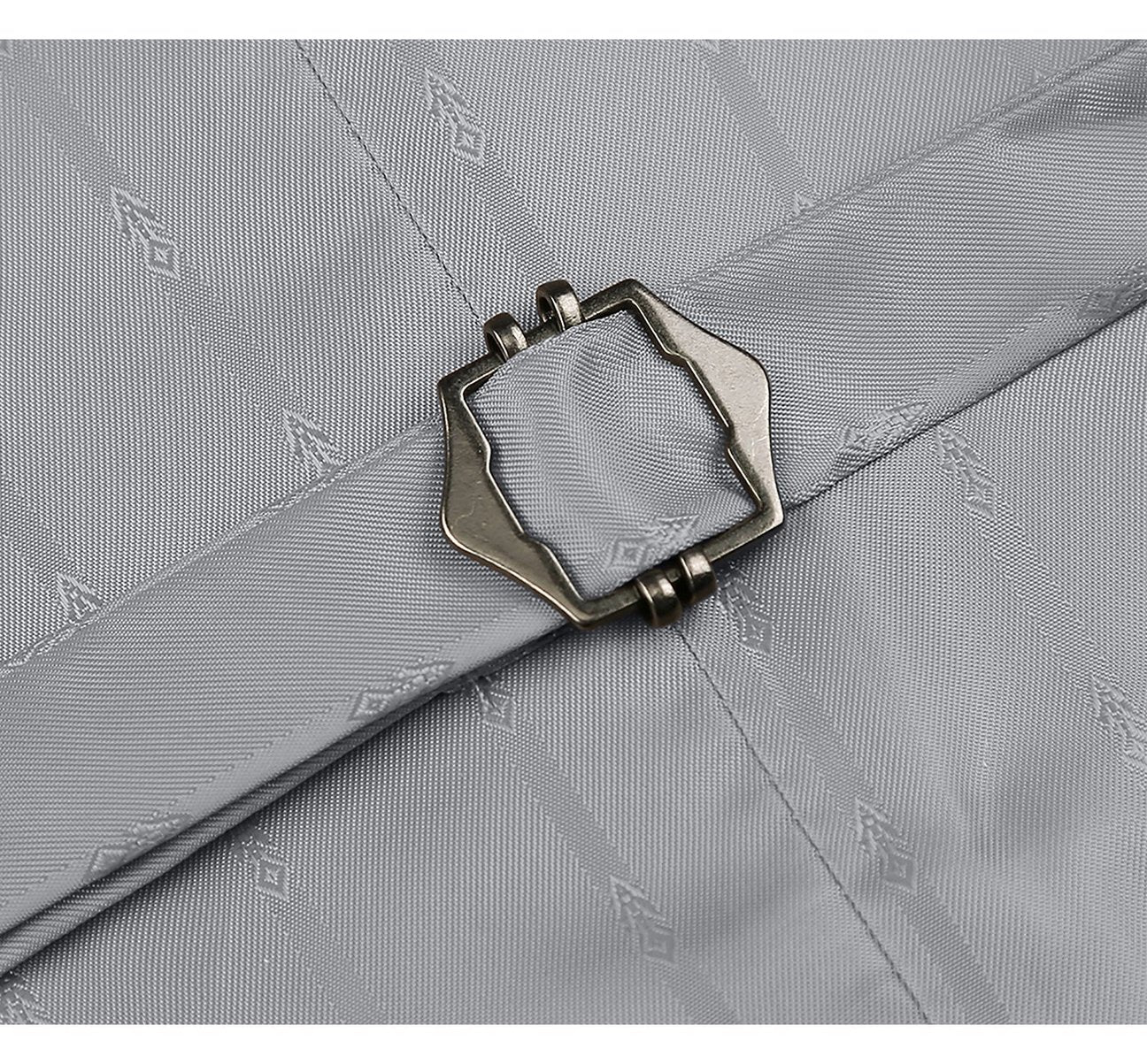 A man wearing an Alessandro Vitello by Renoir Grey Formal Regular Fit Suit Vest, Sharkskin Waistcoat 207-2, styled in light gray, pairs it with dark pants. His striped shirt and patterned tie complete the sophisticated ensemble crafted from a blend of polyester viscose fabric. With his hands in his pockets, the look exudes elegance and style.