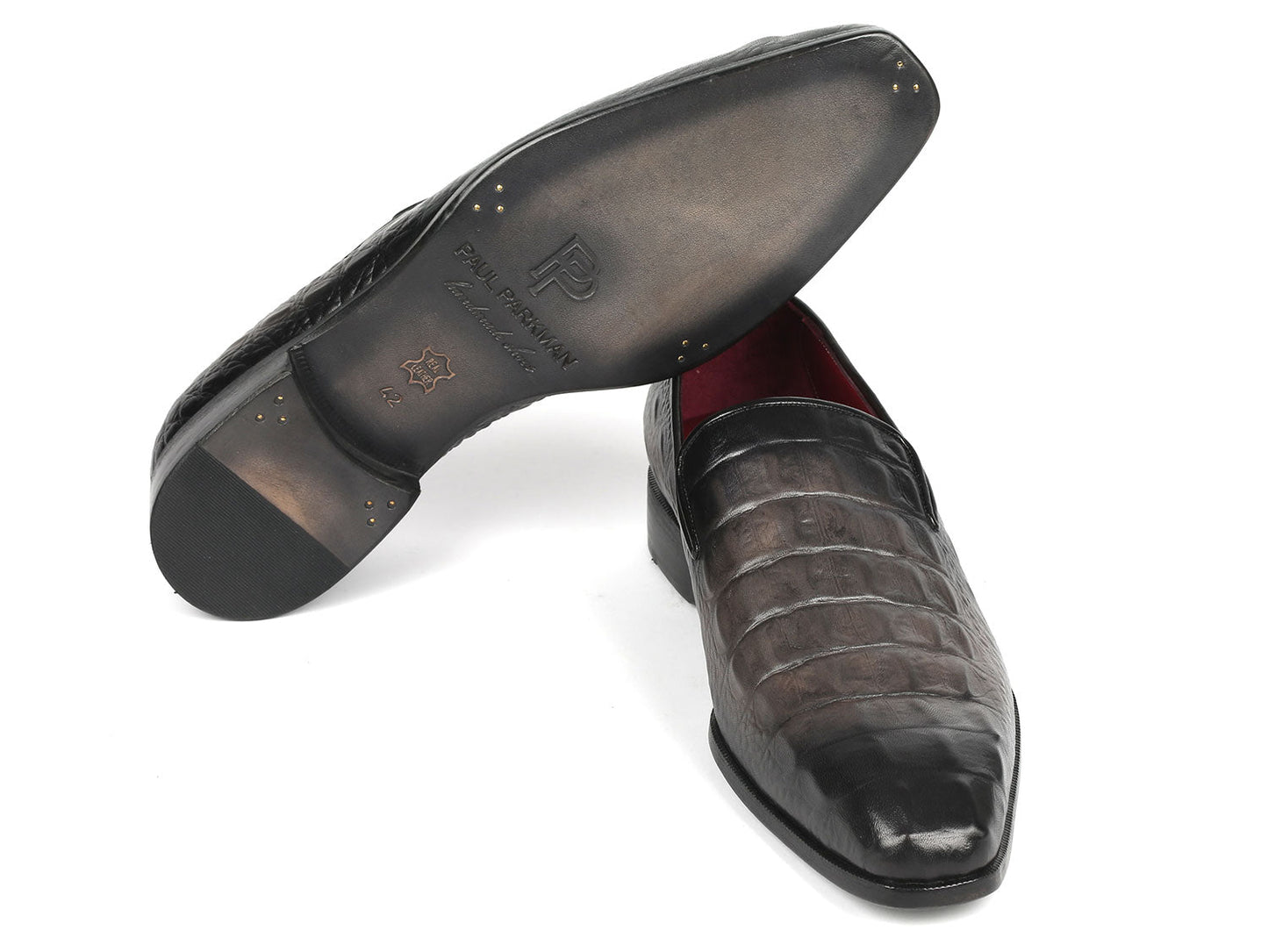 A pair of Paul Parkman Gray Crocodile Embossed Calfskin Loafers, these crafted beauties are perfect for those who appreciate the finer details.