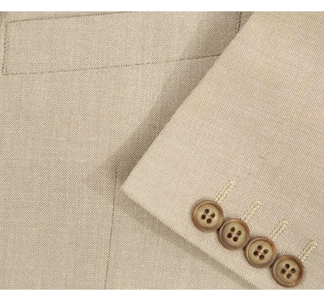 A man wearing the Alessandro Vitello by Renoir 2-Piece Slim Fit Notch Lapel Solid Suit 203-11 is adjusting his blue tie with one hand against a plain white background.