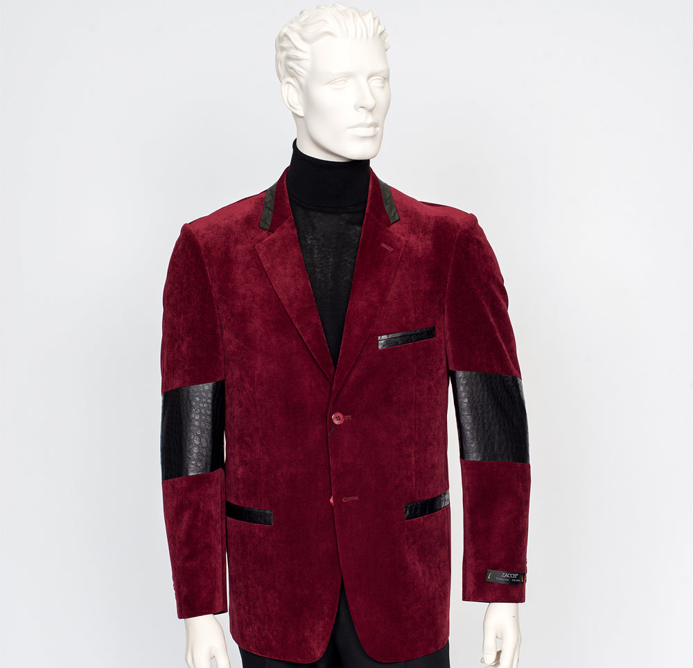A mannequin is dressed in the ZACCHI Velour Sport Jacket, model 73436, featuring burgundy velour with black leather accents and a peak lapel, paired with a black turtleneck.