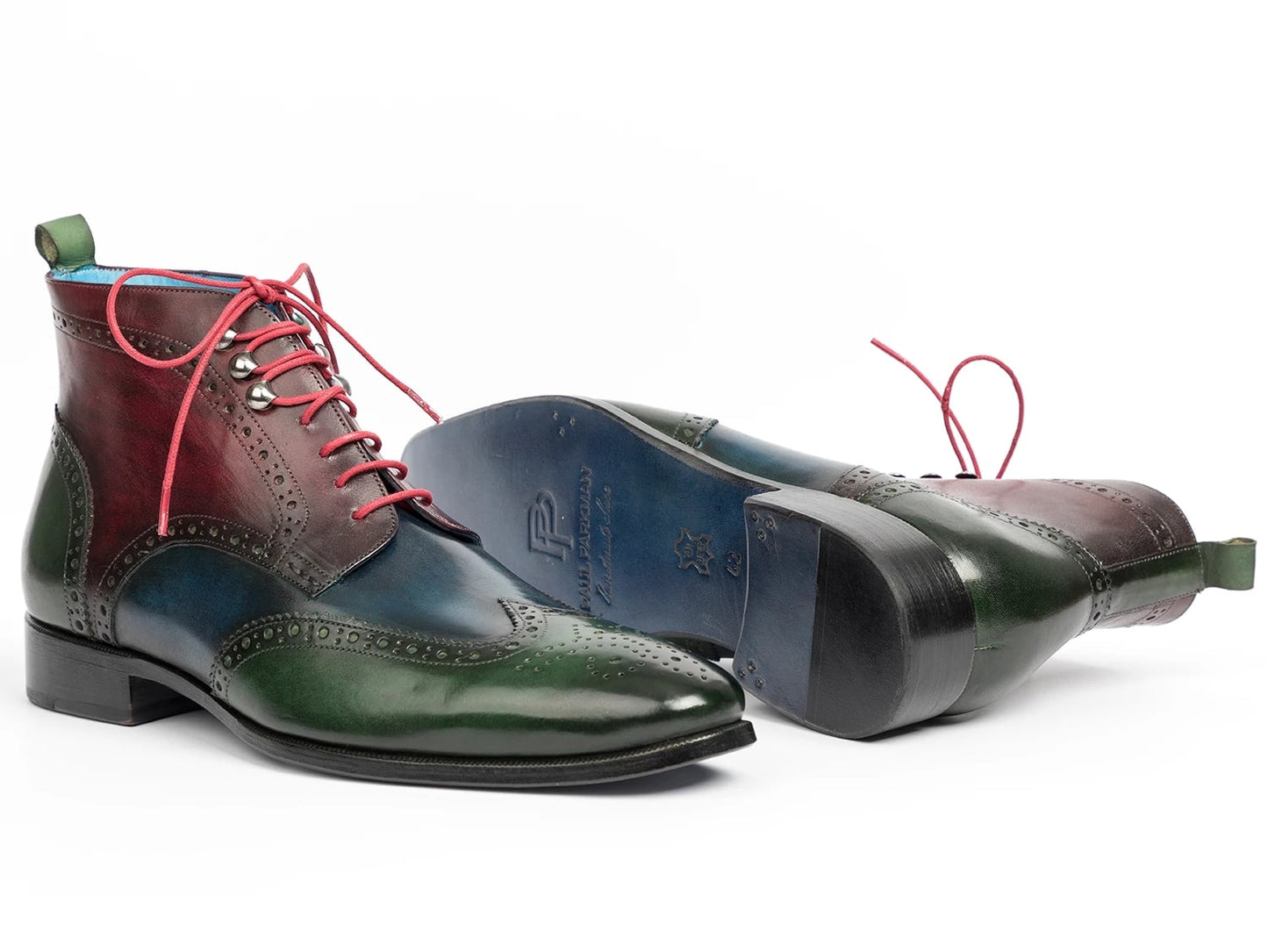 Introducing the Paul Parkman Wingtip Ankle Boots Three Tone Green Blue Bordeaux - 777-GRN-BLU by Paul Parkman. These stylish hand-painted leather ankle boots showcase a vibrant green, blue, and bordeaux gradient design. They are accentuated with pink laces and feature decorative perforations in an elegant three-tone wingtip style, exuding flair and personality.