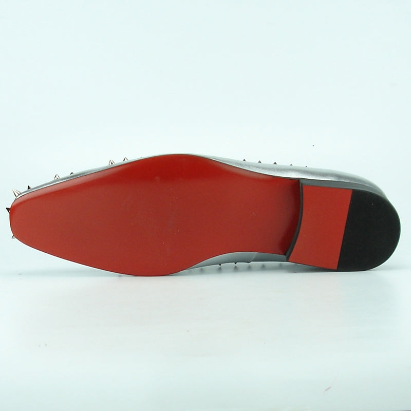 The FI-7107 Silver Fiesso by Aurelio Garcia features a fashion-forward suede upper and is stylishly embellished with metallic spikes.