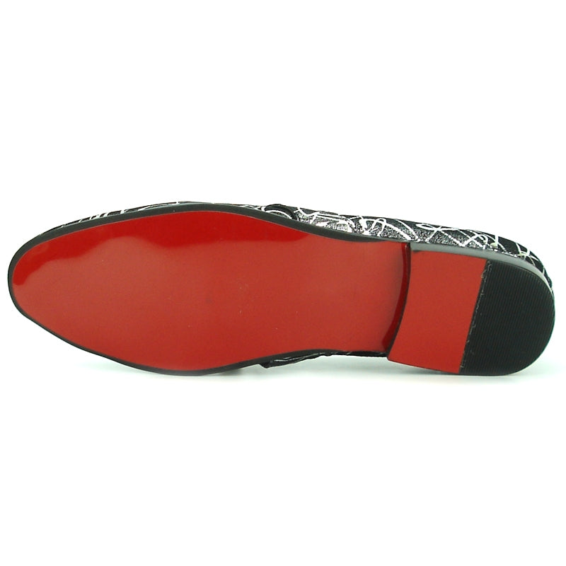 The FI-7215 Silver Fiesso by Aurelio Garcia Shoes from the Fiesso brand boast a chic design with black and white leather, a pointed toe, abstract patterns, and a stylish decorative chain with pearls across the top, capturing the refined elegance of slip-on loafers.