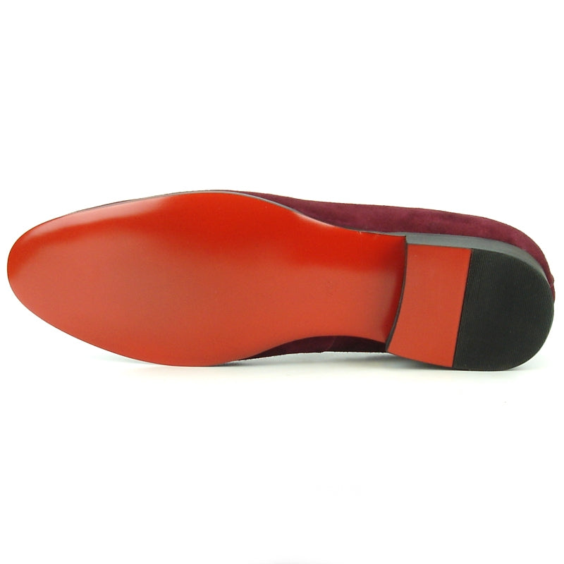 A single FI-7216 Burgundy Suede loafer by Fiesso, featuring a slight heel, elegantly displayed against a white background.