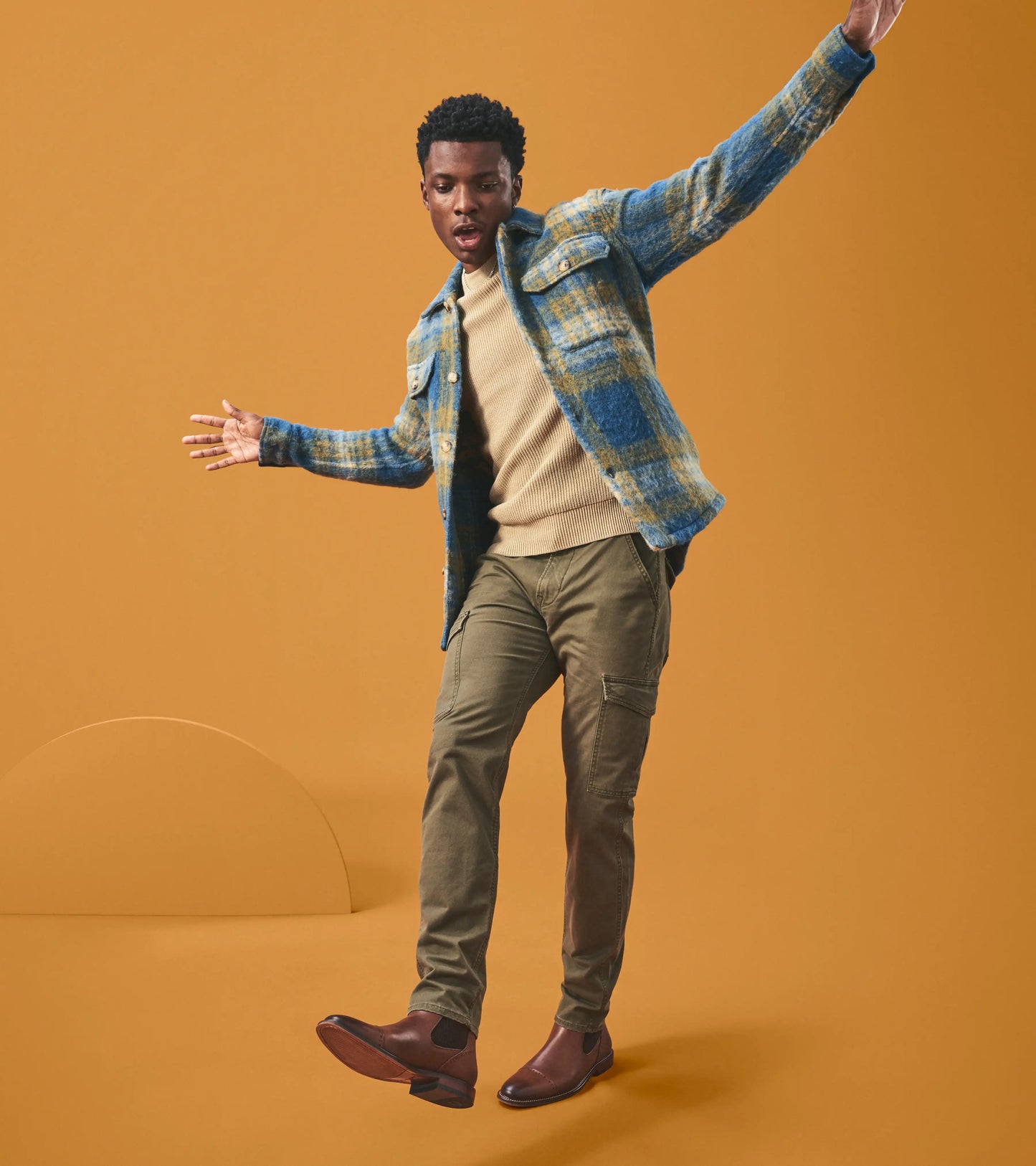 Chocolate Chelsea boot by Stacy Adams, known as the Maury Cap Toe, showcases elastic side panels for ease of wear and a RedZone Insole for enhanced comfort, featuring elegant perforated detailing on the toe.